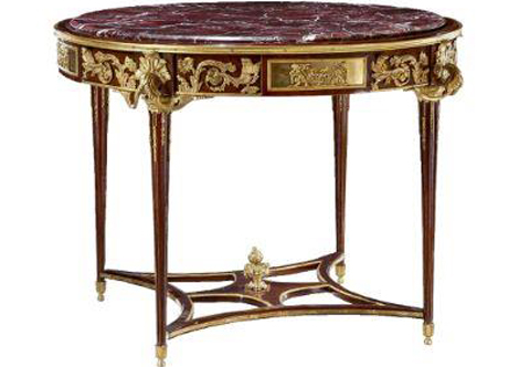 An important louis xvi style Grand guéridon, after the model made by François Linke after the celebrated model of the Table des Muses commissioned by Pierre-Elisabeth de Fontanieu for his use in the Hotel du Garde-meuble in 1771 and made by Jean-Henri Riesener